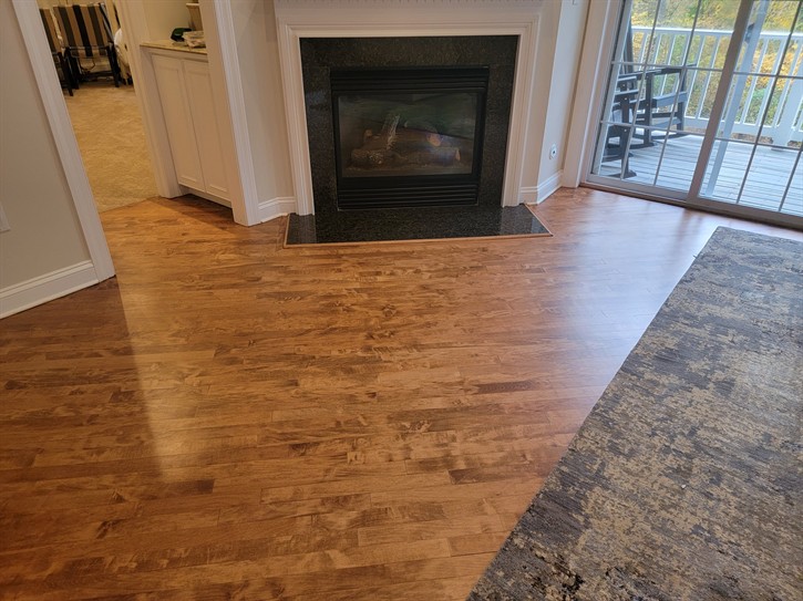 Beautiful Maple Hardwood, restored to it's original scratch free state. Eliminate Fading, pet stains and scratches with Hardwood Refnishing.